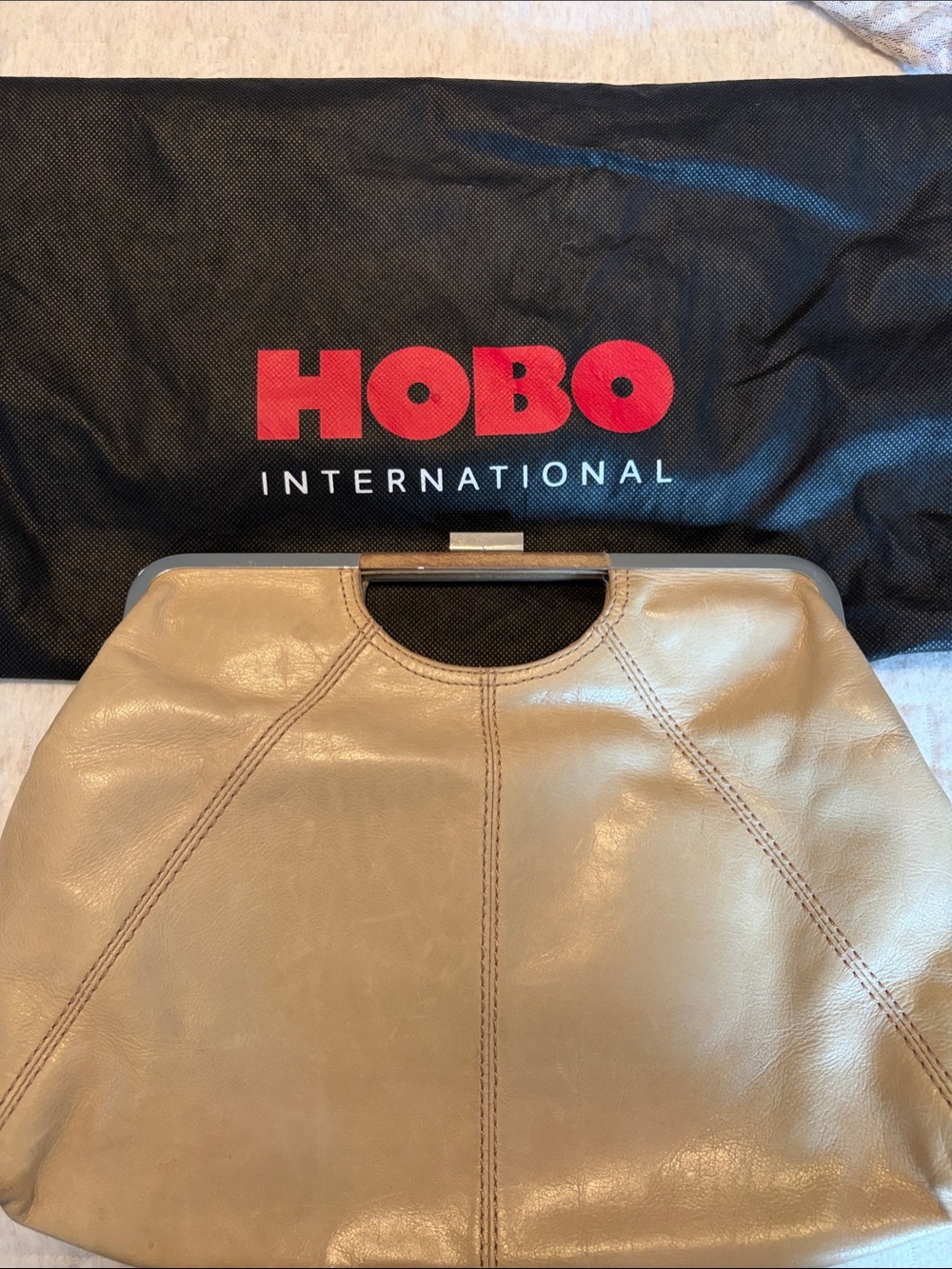 HOBO Beige Leather Frame Clutch with Floral Lining